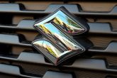 The emblem of Japanese automaker Suzuki Motor, China's export curbs on rare earth metals