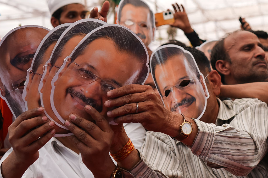 Supporters of India's detained opposition leader Arvind Kejriwal